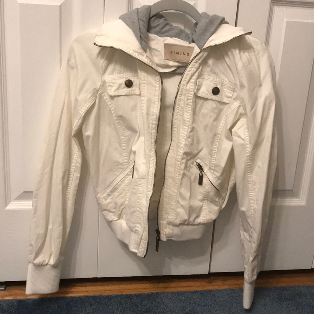 Lightweight white zip up jacket with grey hood